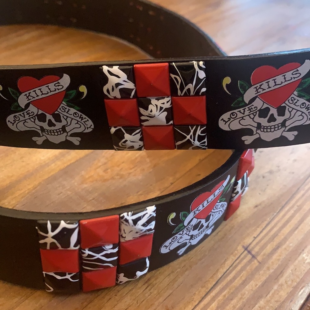 Red, black pyramid studded belt